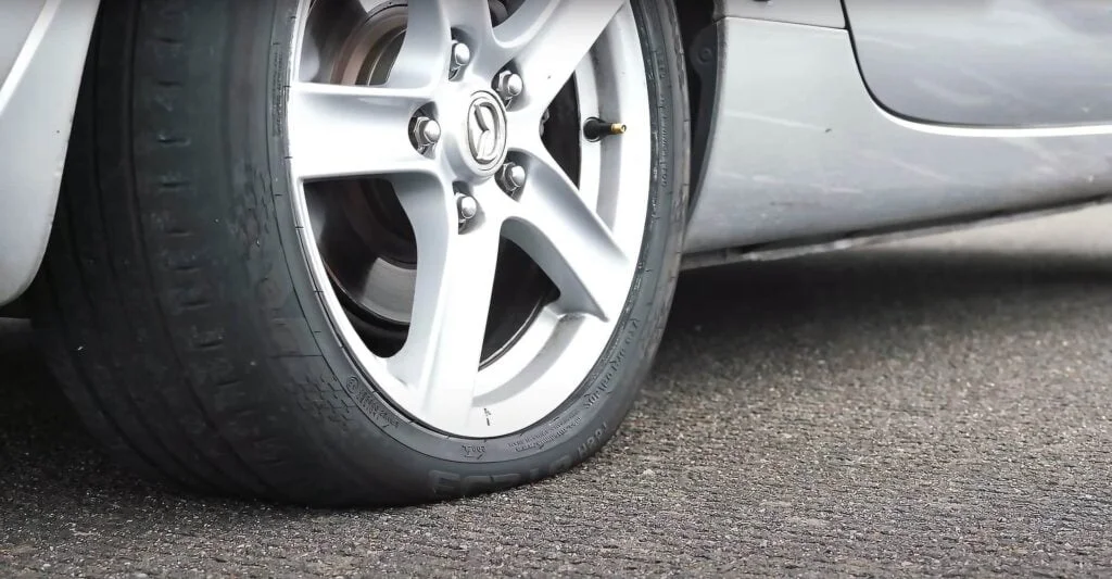 Uneven Tire Wear: Causes, Prevention, and Fixes 2 Deflated Tire