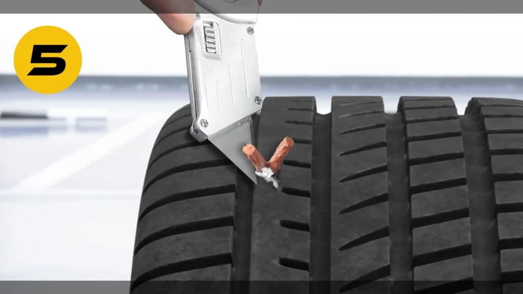 Tire Plug vs Patch: Which One Is More Effective in Fixing a Flat Tire? 6 Tire Plugging Step 5: Cutting the extra parts