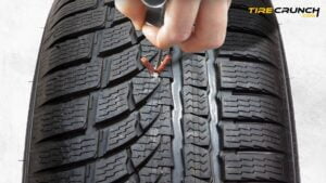 Plugging a tire: Inserting the plug