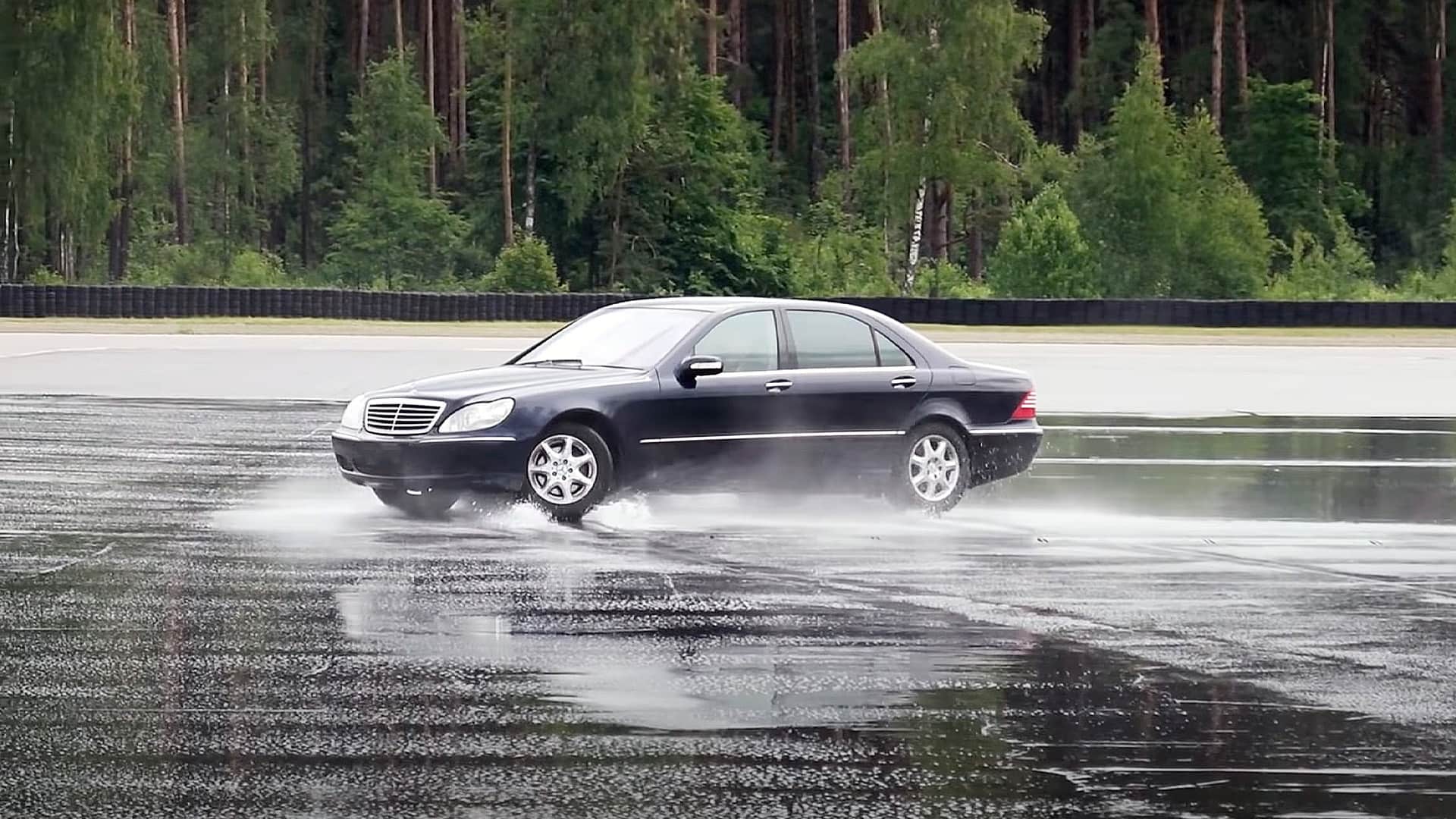 Car spinning out on wet road