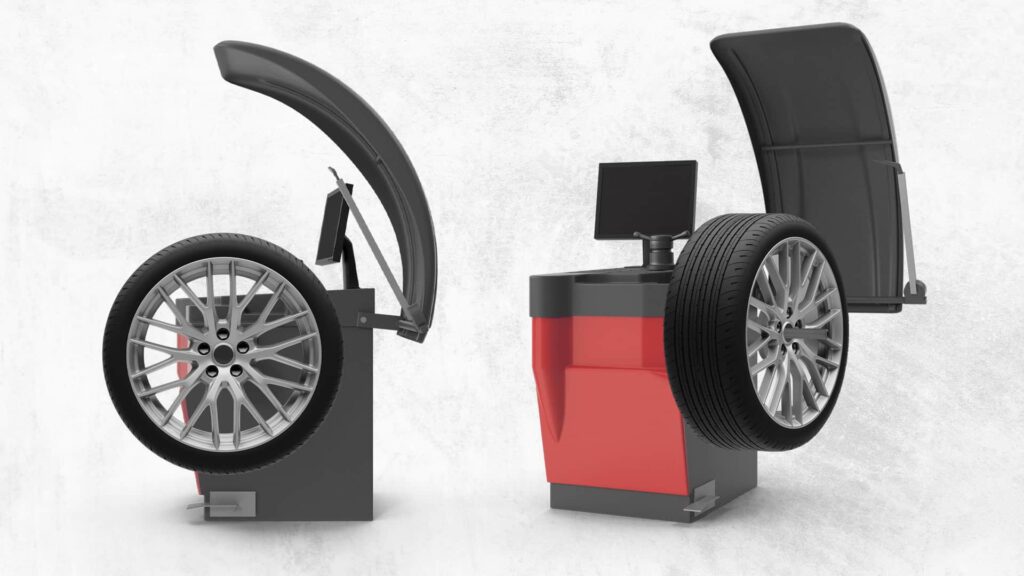 Dynamic tire balancing machine